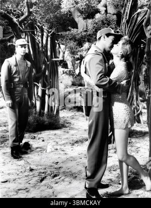 LESLIE NIELSEN JACK KELLY und ANNE FRANCIS in FORBIDDEN PLANET 1956 Regisseur FRED M. WILCOX Männerkostüme Walter Plunkett Miss Frances Kostüme Helen Rose Loew / Metro Goldwyn Mayer (MGM) Stockfoto