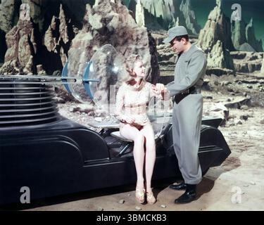 ANNE FRANCIS und LESLIE NIELSEN in FORBIDDEN PLANET 1956 Regisseur FRED M. WILCOX Männerkostüme Walter Plunkett Miss Frances Kostüme Helen Rose Loew / Metro Goldwyn Mayer (MGM) Stockfoto