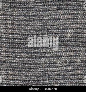 Nahtlose 4K-Fototextur aus grauem geripptem, gewebtem Naturwollpullover. Stockfoto