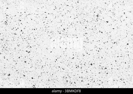 Hochauflösendes, nahtloses Foto einer weißen strukturierten Oberfläche mit schwarzen Sprenkeln, geeignet als Hintergrund, Muster oder Designelement in Kreationen Stockfoto