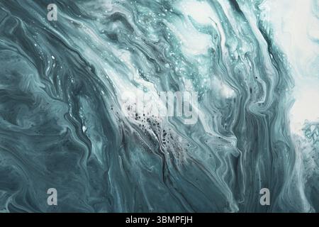Fluide Art. Flüssiges Türkis, abstrakte Tropfen und Wellen. Hintergrund oder Textur mit Marmoreffekt Stockfoto