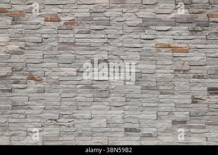 Moderner grauer Backsteinhintergrund. Stockfoto