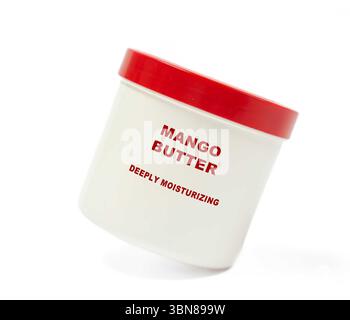Mangobutter reich an Vitaminen, macht die Haut weicher und spendet langanhaltende Feuchtigkeit. Stockfoto