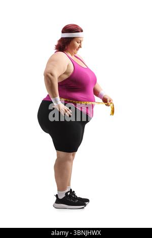 Damen in Übergröße mit kontrollierter Taillengröße isoliert auf weißem Hintergrund Stockfoto