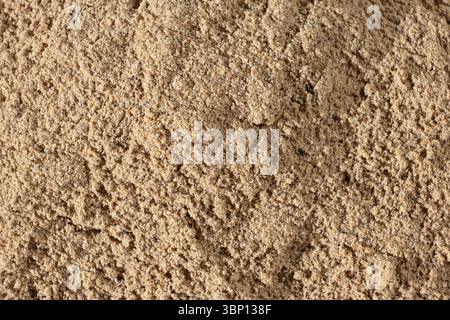 Leinsamenmehl Makrostruktur Draufsicht. Kulinarischer Hintergrund. Stockfoto