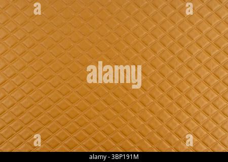 Braune Makrolederstruktur, braune Hintergrundstruktur aus Kunstleder. Brauner, strukturierter Lederhintergrund. Stockfoto