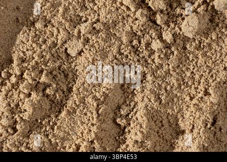 Leinsamenmehl Makrostruktur Draufsicht. Kulinarischer Hintergrund. Stockfoto