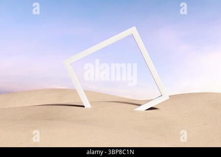 Weißer Rahmen, der in einer Sandwüste unter einem klaren blauen Himmel mit sanften rosa Wolken steht, schafft eine surreale und minimalistische Landschaft Stockfoto