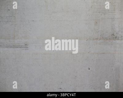 Betontextur Hintergrund. Feine Materialstruktur an einer Innenwand. Abstrakter leerer Hintergrund von einer Gebäudefläche. Stockfoto