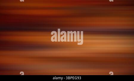 Abstrakter Bewegungsunschärfe Hintergrund mit warmen Tönen horizontalen Linien Stockfoto