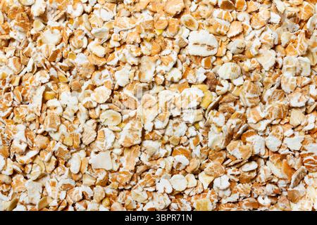 Nahaufnahme der Fototextur von Getreidehaferflocken. Stockfoto