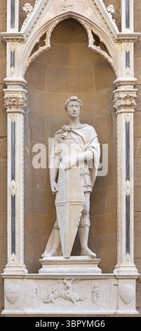 FLORENZ, ITALIEN - 17. MÄRZ 2025: Die Statue St. Georg an der Fassade von Orsanmichele von Donatello (1416). Stockfoto