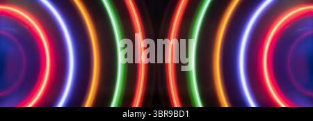 Lebendig leuchtende Neonlichtkreise in mehrfarbigen Tönen mit faszinierender und lebendiger abstrakter Anzeige, geeignet für Hintergründe und künstlerische Inhalte Stockfoto