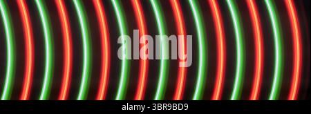 Lebendig leuchtende Neonlichtkreise in mehrfarbigen Tönen mit faszinierender und lebendiger abstrakter Anzeige, geeignet für Hintergründe und künstlerische Inhalte Stockfoto