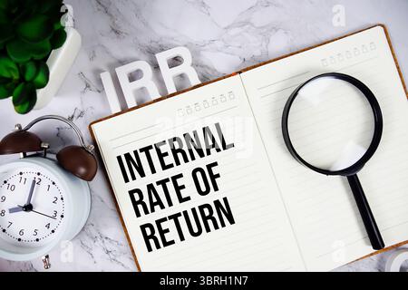 IRR - Internal Rate of Return acronym on notepad, Business concept background Stockfoto