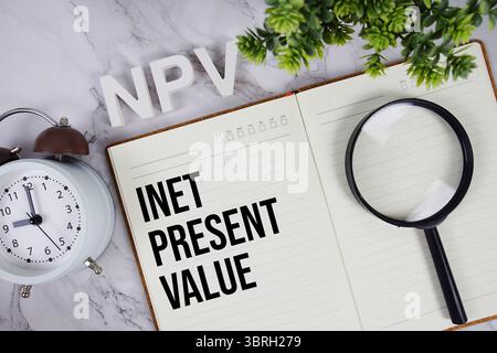 NPV - Net Present Value acronym on notepad, Business concept background Stockfoto