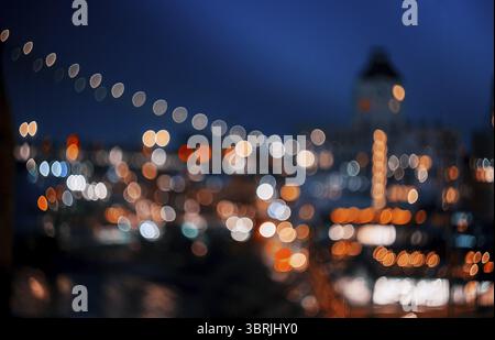 Skyline von Downtown New York Manhattan abstrakte verschwommen Lichter Stadt Licht in der Nacht bokeh Stockfoto
