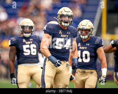 14. September 2019, Annapolis, Maryland, USA: Navy Midshipmen Linebacker DIEGO FAGOT (54) feiert nach einem Tackle im ersten Quartal gegen die East Carolina Pirates während ihres Spiels der NCAA American Athletic Conference während der NCAA Football Action. Navy gewann das Spiel mit 42:10. (Bild: © Rusty Jones/ZUMA Wire) Stockfoto