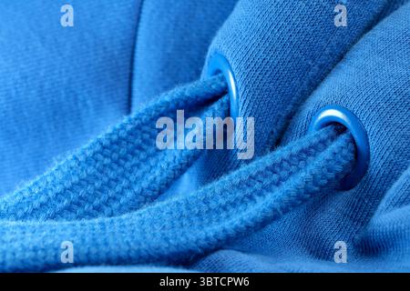 Blauer Textilinhalt großer Wollstrick, Nahhintergrund, Makrofotografie Stockfoto