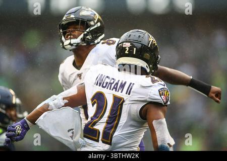 20. Oktober 2019: Baltimore Ravens Quarterback Lamar Jackson (8) und Baltimore Ravens Running Back Mark Ingram II (21) feiern einen Ravens Touchdown während eines Spiels zwischen den Baltimore Ravens und den Seattle Huskies im CenturyLink Field in Seattle, WA. Die Ravens besiegten die Seahawks mit 30:16. Sean Brown/CSM(Credit Image: &Copy; Sean Brown/CSM via ZUMA Wire) Stockfoto