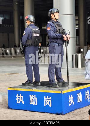 Chinesische private Sicherheitskräfte, bekannt als Bao'an (Baoan oder Boan), sind privat bewohnt und sind ein häufiger Anblick in China. Stockfoto