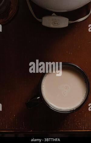 Nahaufnahme von Coffee Cup on Table Stockfoto