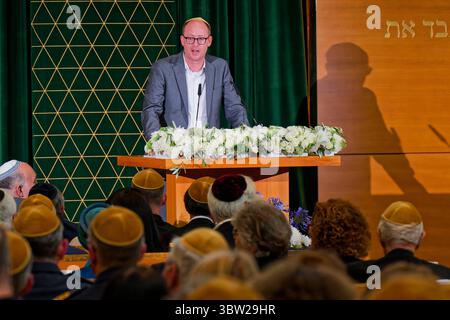 Feier der Israelitischen Kultusgemeinde München und Oberbayern in der Hauptsynagoge Ohel Jakob. Festakt anlässlich des 80. Jahrestage der Wiedergründung der Israelitischen Kultusgemeinde München und Oberbayern sowie der 40-jährigen Präsidentschaft von Dr.h.c.mult. Charlotte Knobloch. Prof. Dr. Philipp Lenhard bei seinem Festvortrag. München Bayern Deutschland *** Feier der Jüdischen Gemeinde München und Oberbayern in der Hauptsynagoge Ohel Jakob anlässlich des 80. Jahrestages der Wiedergründung der Jüdischen Gemeinde München und Oberbayern und des 40. An Stockfoto