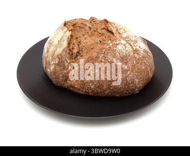 Sauerteig gesäuertes rundes Malzbrot mit verschiedenen Samen Stockfoto