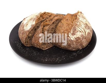 Sauerteig gesäuertes rundes Malzbrot mit verschiedenen Samen Stockfoto