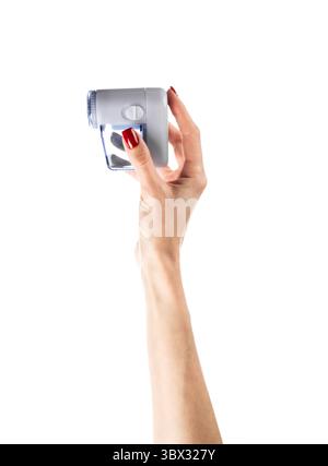 Moderner Elektrorasierer und Pullover aus Wolle Stockfoto