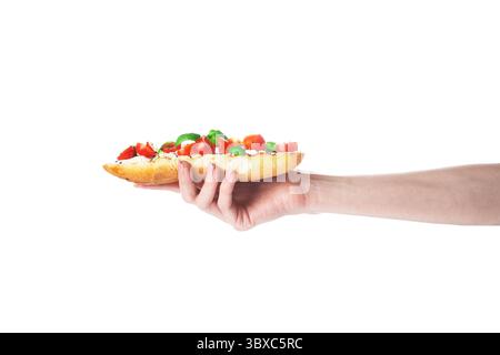Sandwich mit gebratenem Toast, Frischkäse und Tomaten isoliert auf weißem Hintergrund. Italienische Bruschetta. Stockfoto