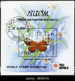 VIETNAM - UM 1991: Eine in Vietnam gedruckte Marke zeigt Heliconius melpomene-Aglaope, um 1991 Stockfoto