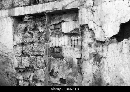 Alte Wand, für Hintergründe oder Texturen. Schwarzweißfoto Stockfoto