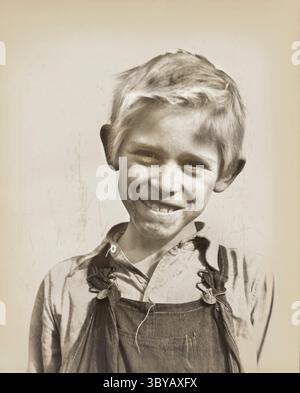 18. September 2018, Kalifornien, USA: Sohn eines Baumwollpflückers, der im Squatters' Camp in der Nähe von Farmersville, Kalifornien, USA, Dorothea lange, U.S. Farm Security Administration, 1936 (Credit Image: © Circa Images/Glasshouse via ZUMA Press Wire) lebt. Stockfoto