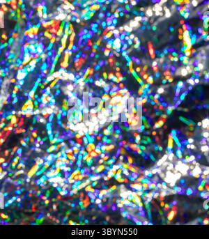 Farbenfroher abstrakter Hintergrund mit lebhaften Lichtreflexionen und holografischem Effekt Stockfoto