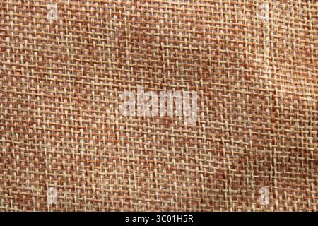 Strukturierter Hintergrund aus braunem Jute Stockfoto
