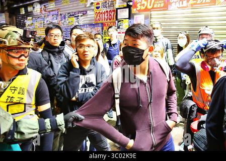 1. Dezember 2019, Hongkong, Volksrepublik China: Hongkong, China. Dezember 2019. Tausende demokratischer Demonstranten nehmen an dem friedlichen marsch von Tsim Sha Tsui nach Hung Hom Teil. Mehr als 100 Menschen werden von der Polizei in Mongkok um Mitternacht angehalten und durchsucht. (Foto: © Gonzales/Gonzales Foto via ZUMA Press) Stockfoto
