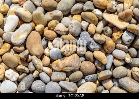 Kieselsteine am Strand Stockfoto