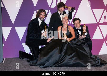 24. Februar 2019 – Hollywood, Kalifornien, USA – ANDREW WYATT, ANTHONY ROSSOMANDO, MARK RONSON und LADY GAGA posieren im Presseraum während der 91. Annual Academy Awards. (Foto: © T. Lowe/Globe Photos via ZUMA Wire) Stockfoto