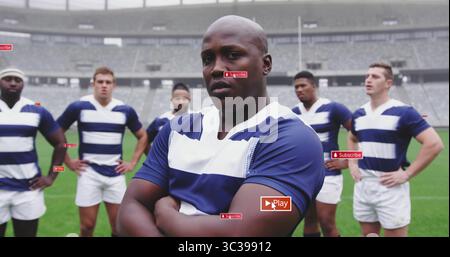 Ein muskulöser afroamerikanischer Rugbyspieler führt fünf Mannschaftskameraden im Stadion an, mit Torpfosten Stockfoto