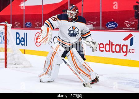 10. Mai 2021: Edmonton Oilers Torhüter Mikko Koskinen (19) fängt den Puck in der Nähe seines Netzes ab, während der Edmonton Oilers gegen das Montreal Canadiens Spiel im Bell Centre in Montreal, Quebec. David Kirouac/CSM(Credit Image: &Copy; David Kirouac/CSM via ZUMA Wire) Stockfoto