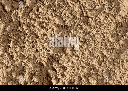 Leinsamenmehl Makrostruktur Draufsicht. Kulinarischer Hintergrund Stockfoto