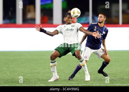 September 2018; Foxborough, MA, USA; der Verteidiger Alvas Powell (2) und Diego Fagundez (14) der New England Revolution in einem MLS-Spiel zwischen Portland Timbers und New England Revolution im Gillette Stadium. Das Spiel wurde bis zu einem Unentschieden von 1-1 ausgetragen. Anthony Nesmith/CSM(Credit Image: &Copy; Anthony Nesmith/CSM via ZUMA Wire) Stockfoto