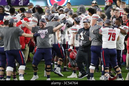21. Dezember 2019, Orlando, FL, USA: Liberty Players feiern nach einem Sieg gegen Georgia Southern 23-16 im Cure Bowl im Exploria Stadium in Orlando, Florida, am Samstag, den 21. Dezember 2019. (Kreditbild: © TNS via ZUMA Wire) Stockfoto
