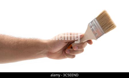 Hand halten Sie einen Pinsel bereit für den Gebrauch Stockfoto