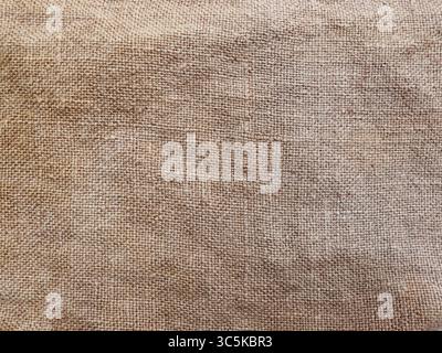 Ländliche Struktur von Säcken. Hintergrund von sehr groben, grobe Gewebe aus Flachs, Jute und Hanf. Sackleinen Tasche Material. Design Element. Stockfoto