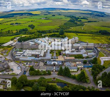 Luftaufnahme des Dartmoor Prison in Princetown, Dartmoor, mit historischer Struktur und umliegendem Moorland bei Tageslicht Stockfoto