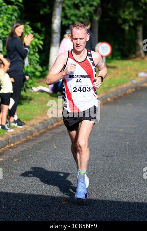 Belfast, Großbritannien. August 2025. 08/2025 Belfast 3000 Menschen haben heute am Feile 5k & 10k Run in West Belfast teilgenommen. Die Rains hielten an einem warmen, schwülen Morgen für die Runners ab. Quelle: Bonzo/Alamy Live News Stockfoto