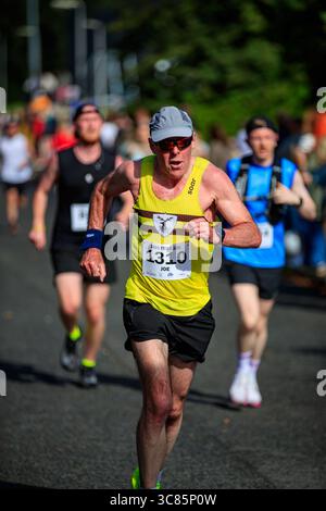 Belfast, Großbritannien. August 2025. 08/2025 Belfast 3000 Menschen haben heute am Feile 5k & 10k Run in West Belfast teilgenommen. Die Rains hielten an einem warmen, schwülen Morgen für die Runners ab. Quelle: Bonzo/Alamy Live News Stockfoto
