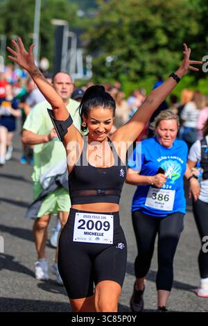 Belfast, Großbritannien. August 2025. 08/2025 Belfast 3000 Menschen haben heute am Feile 5k & 10k Run in West Belfast teilgenommen. Die Rains hielten an einem warmen, schwülen Morgen für die Runners ab. Quelle: Bonzo/Alamy Live News Stockfoto